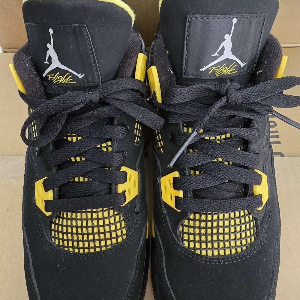 Nike Air Jordan 4 Retro Thunder Kids Black and Yellow Sneakers
